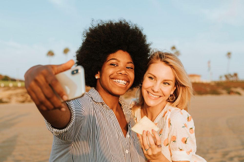 Women taking a selfie at the beach