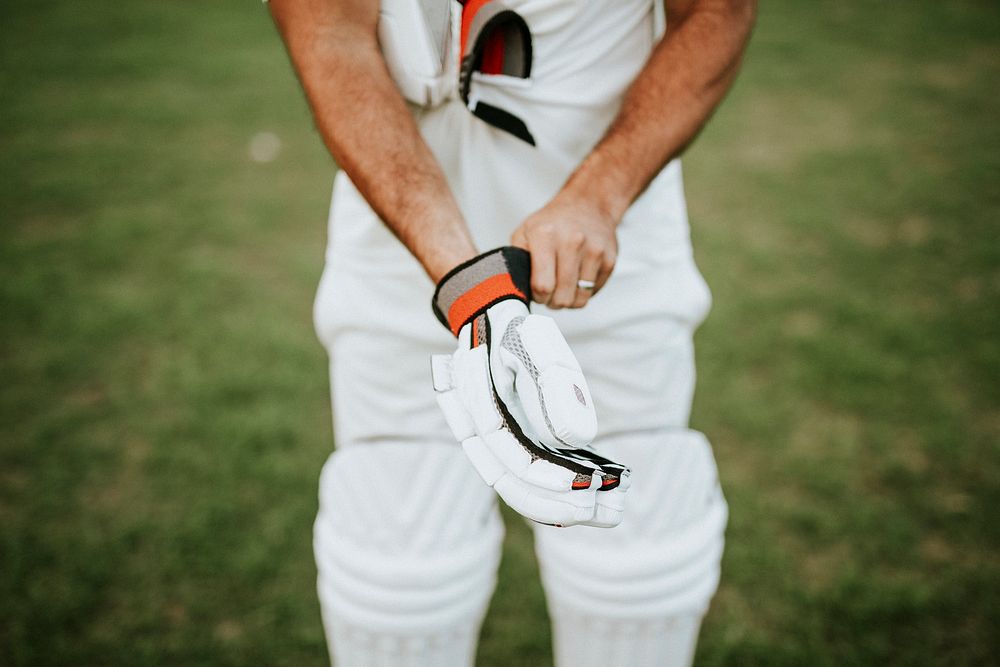 Cricket player getting ready to play