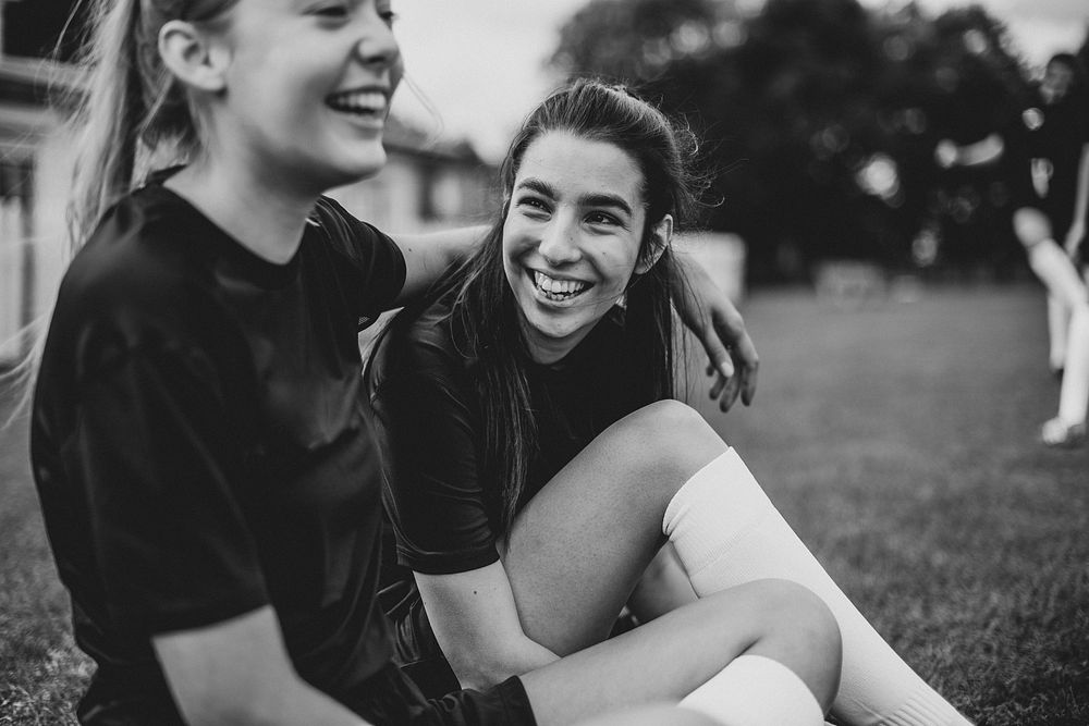 Female football players and friendship concept