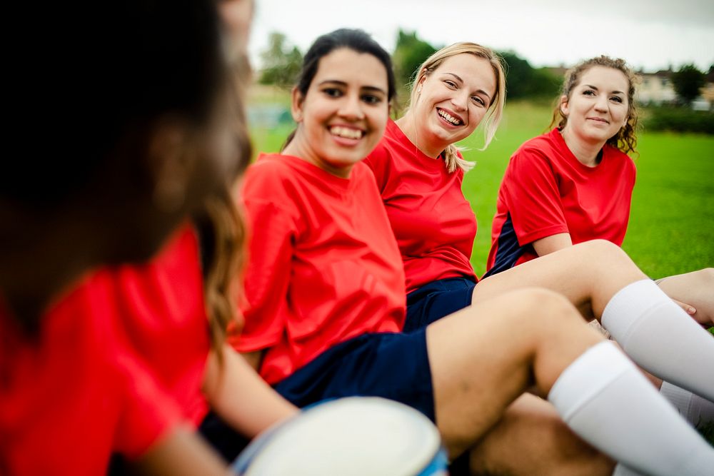 Young female rugby players after a match