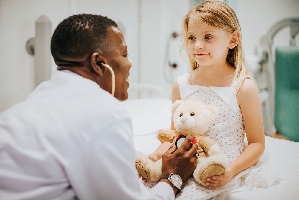 Doctor doing a health checkup on a teddy bear
