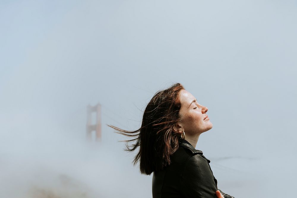 Woman with a misty Golden Gate Bridge, San Francisco