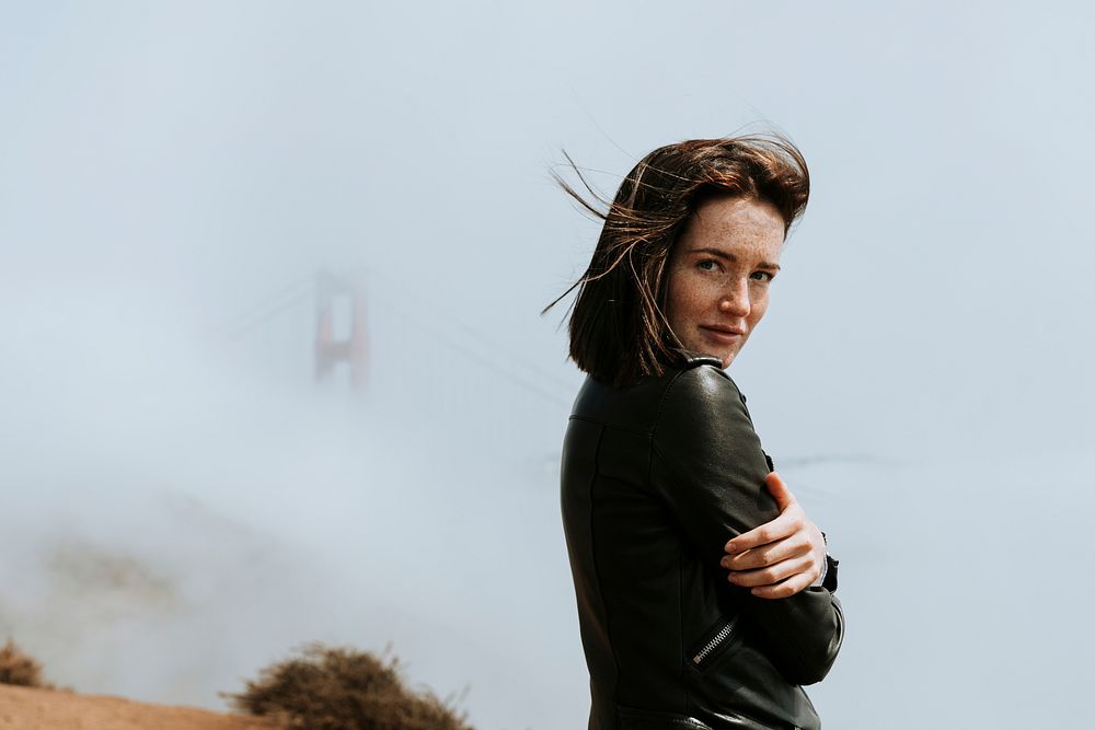 Woman with a misty Golden Gate Bridge, San Francisco