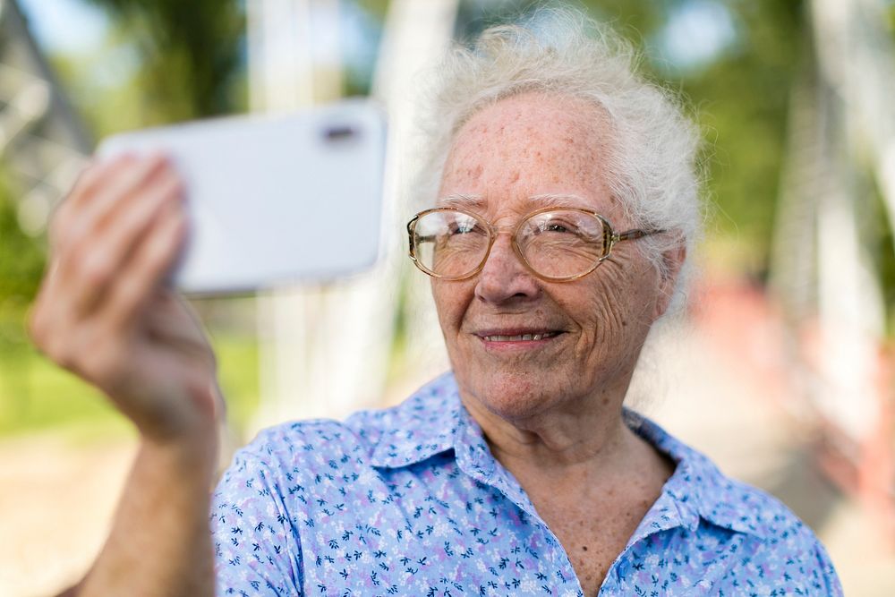 Sweet senior woman taking a selfie