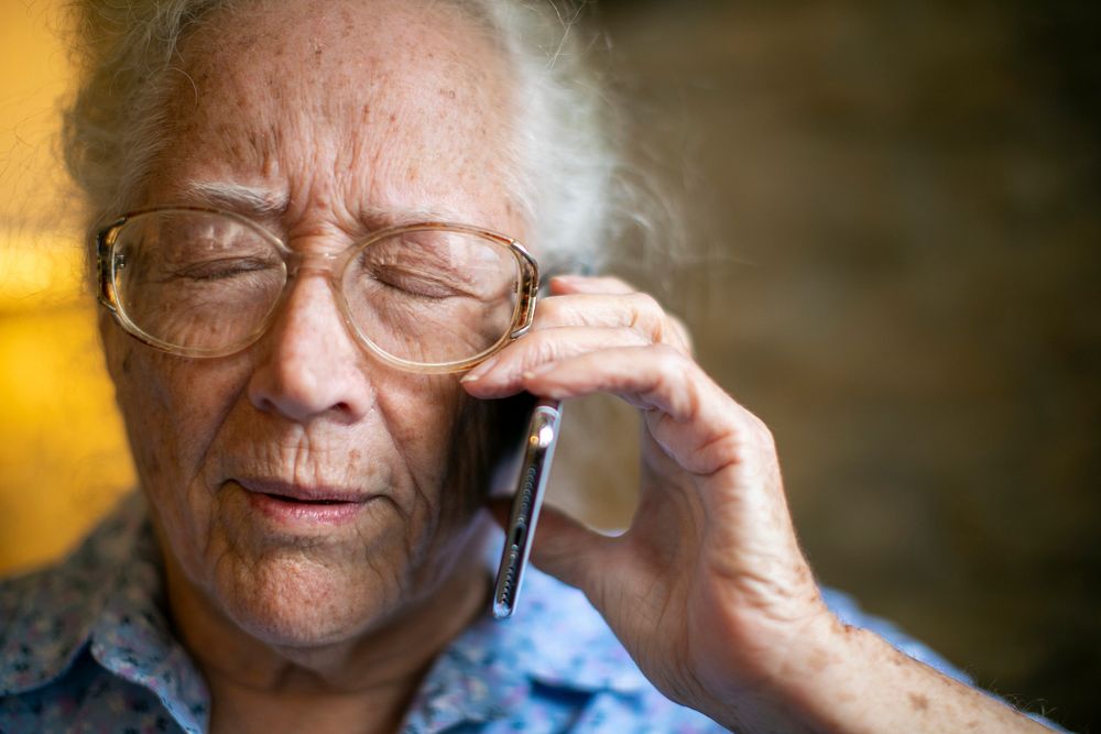 Elderly woman getting bad news