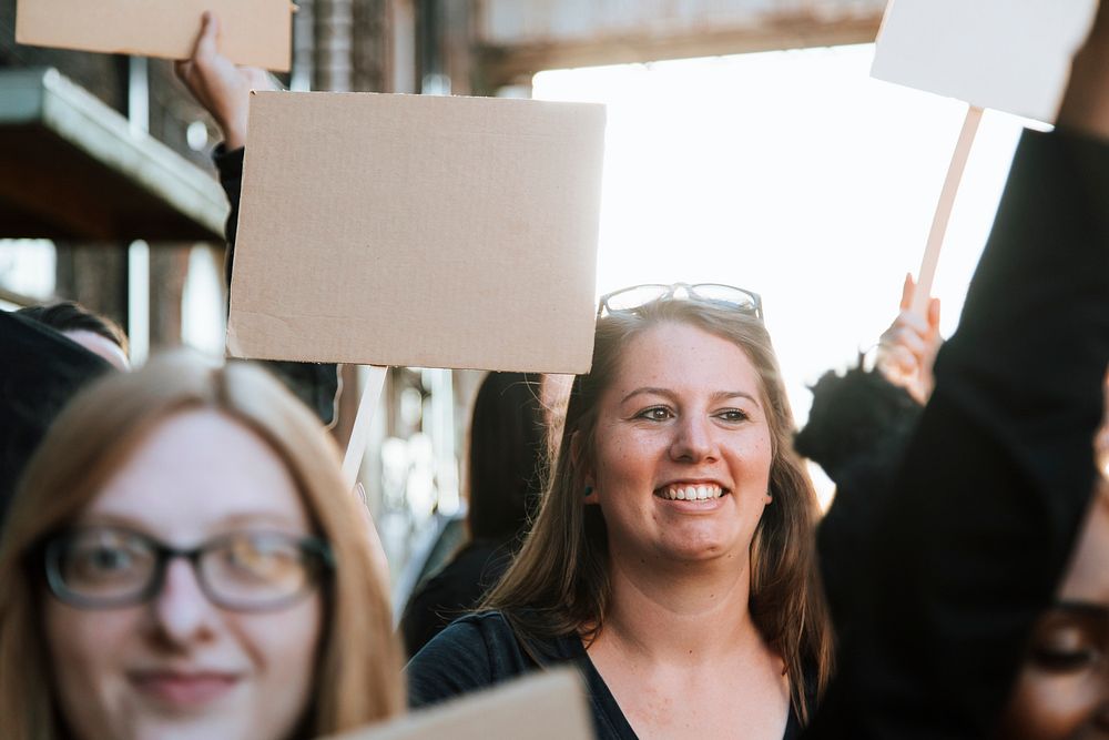 Happy activists marching through the city