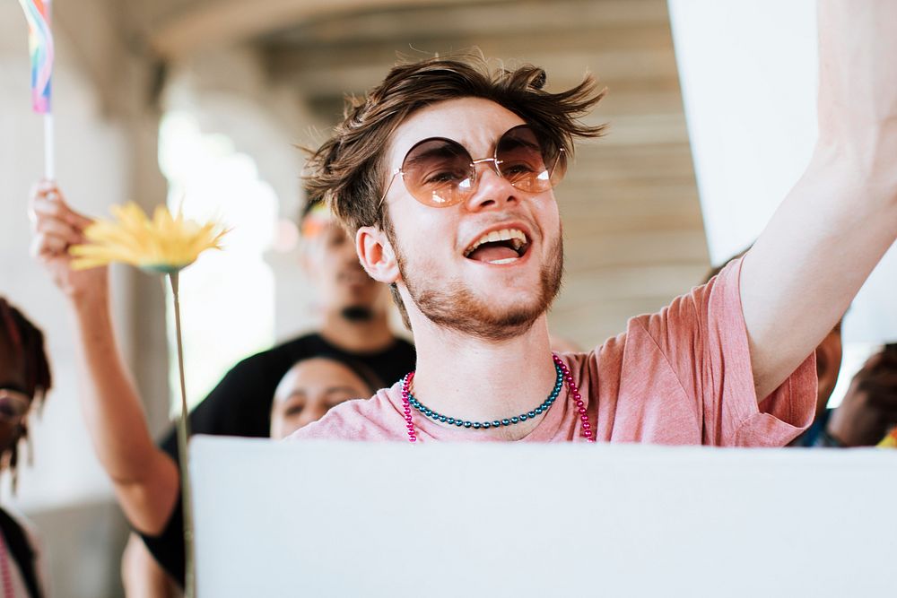 Cheerful gay man at a pride festival