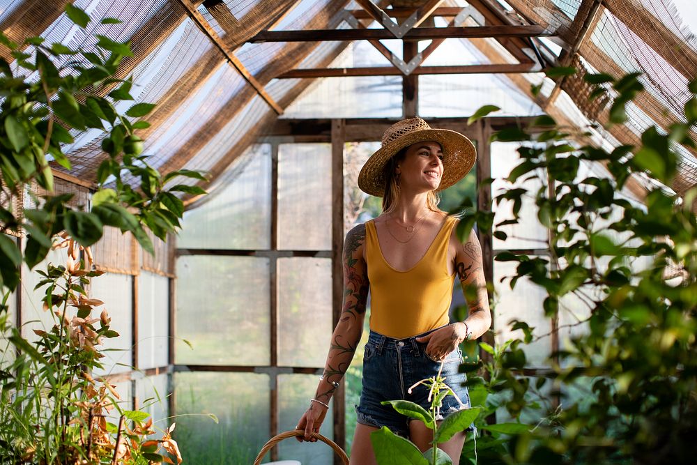 Beautiful woman in a greenhouse