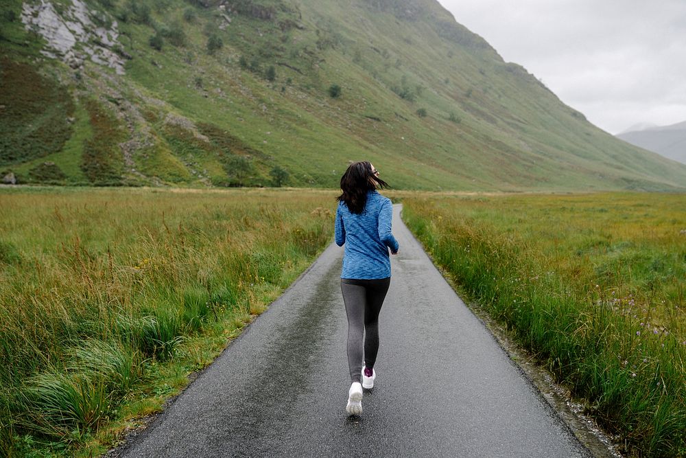 Female jogger in the Highlands