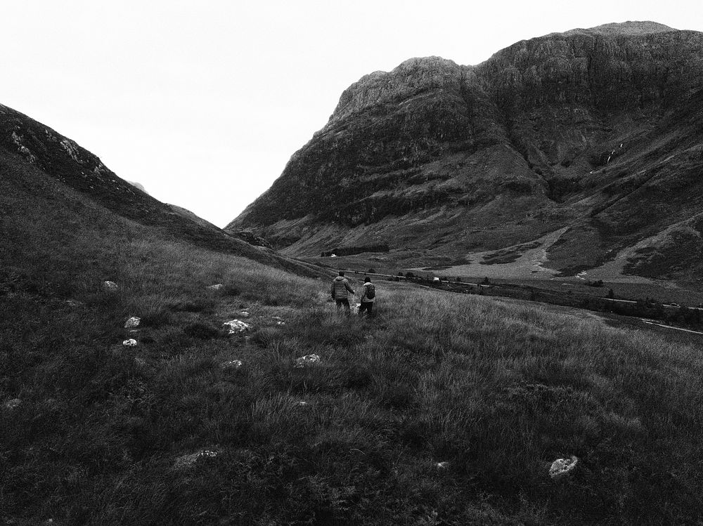 Couple trekking in Glen Etive, Scotland