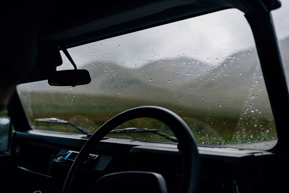 Man driving through the rain