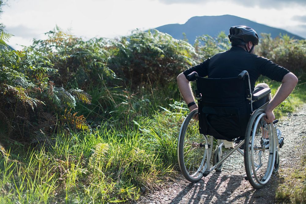 Wheelchair bound man in the wilderness