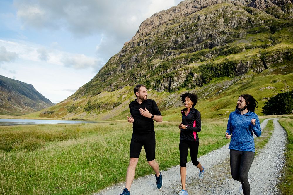 Friends jogging in the Scottish Highlands