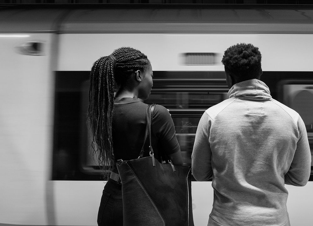 Couple waiting for their train