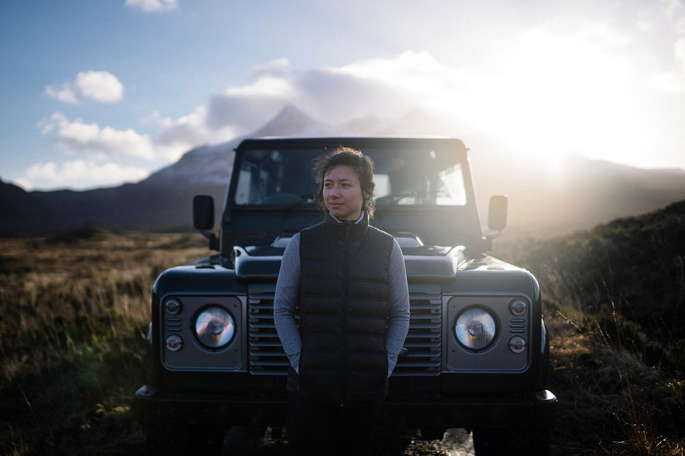 Woman parking her car at Glen Etive, Scotland