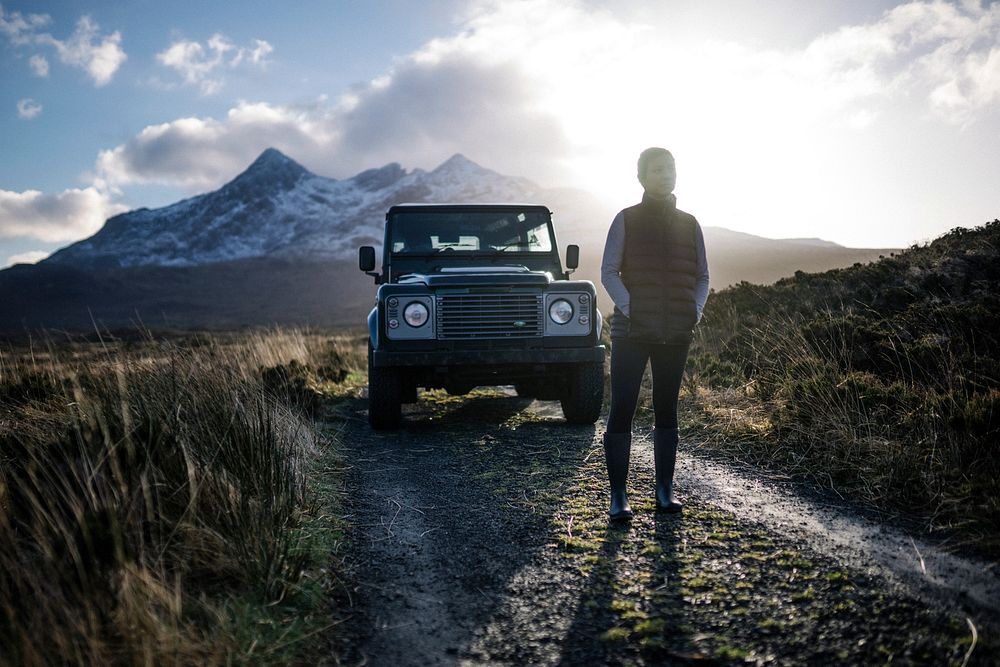 Woman parking her car at Glen Etive, Scotland