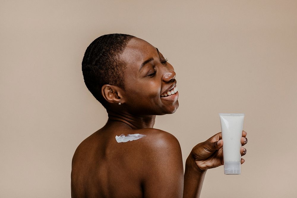 Happy black woman with a container mockup