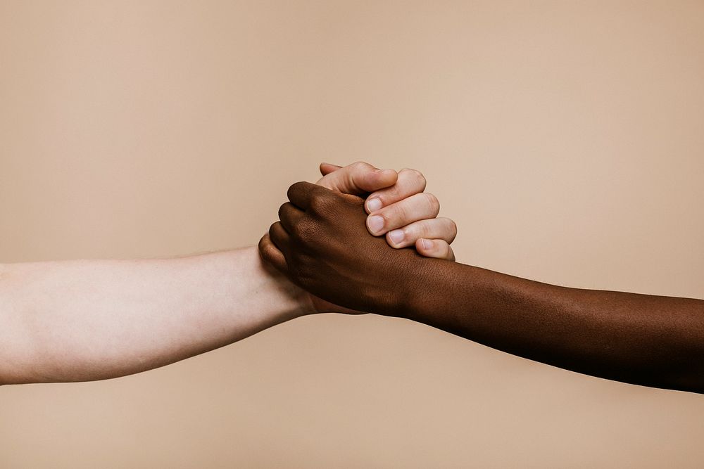 Black Hand Holding White Hand | Premium Photo - Rawpixel