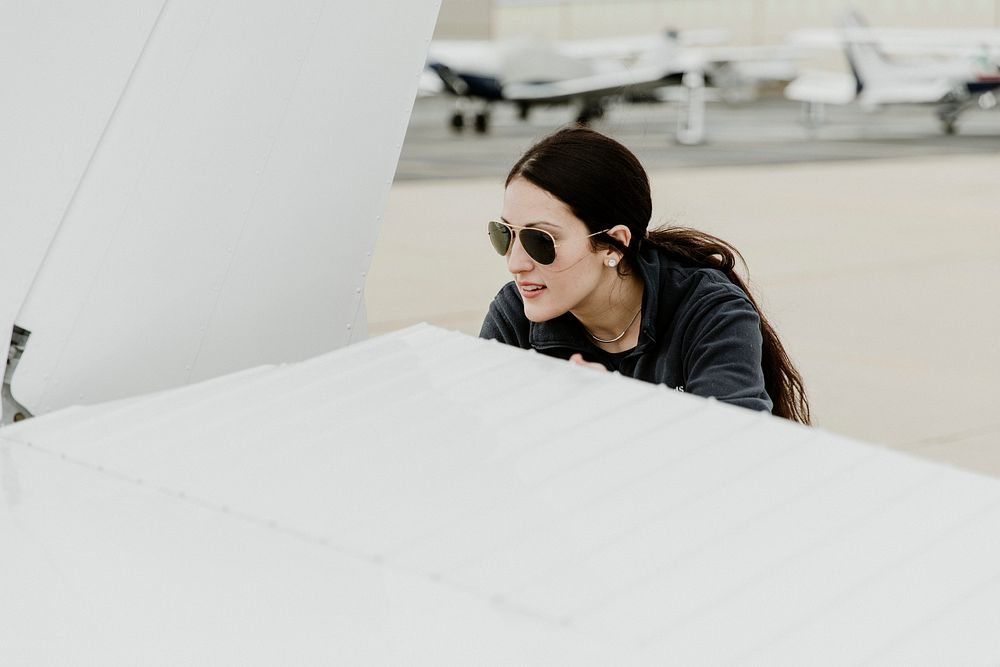 Airwoman doing a preflight check