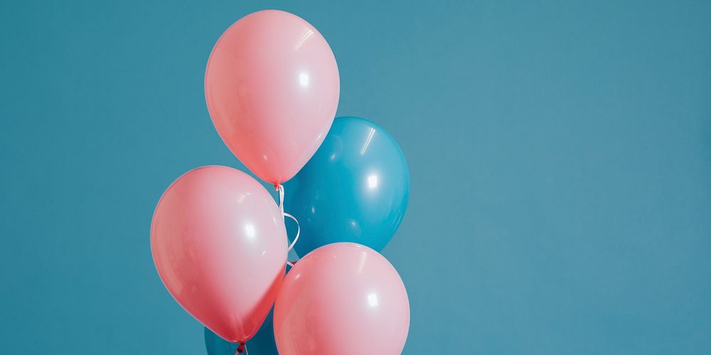 Woman with pink and blue balloons social banner