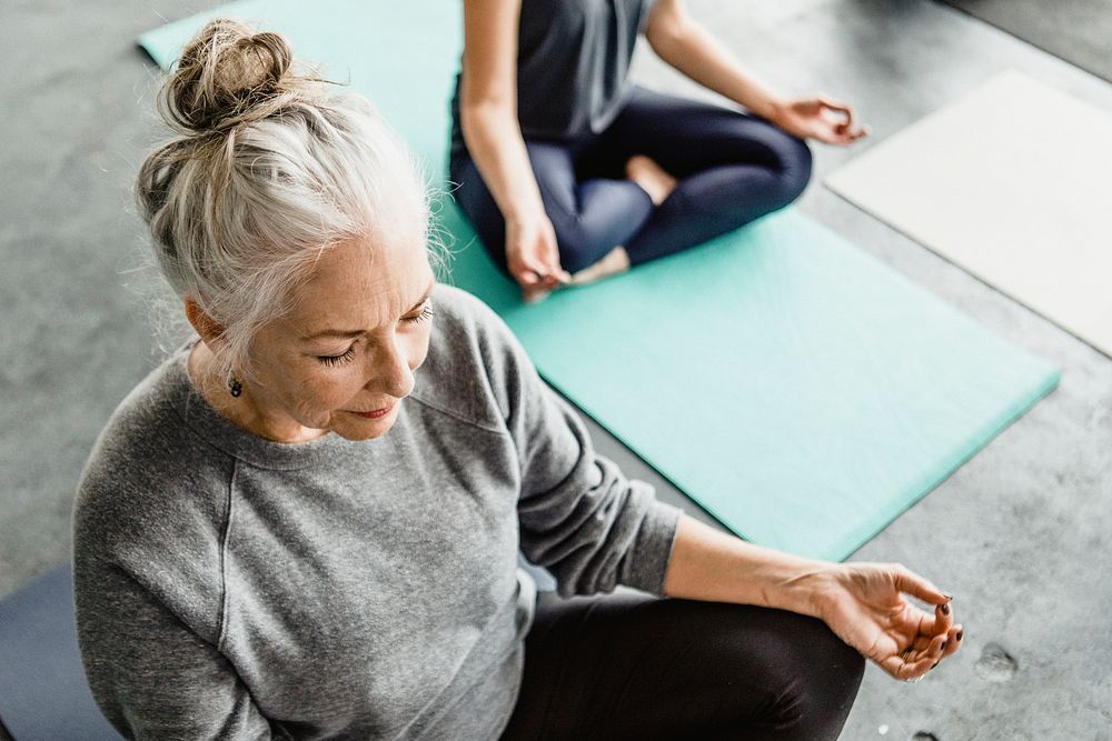 People meditating in a yoga class