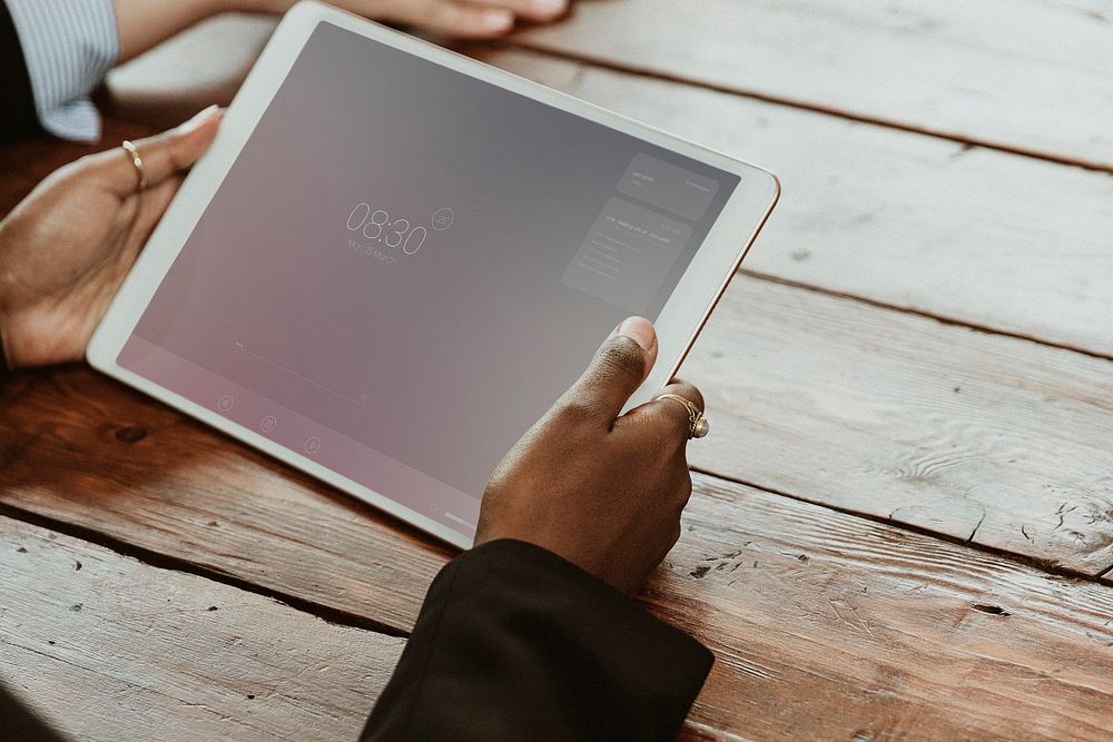 Black woman with a digital tablet mockup