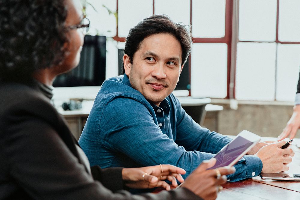 Businesspeople talking in a meeting room