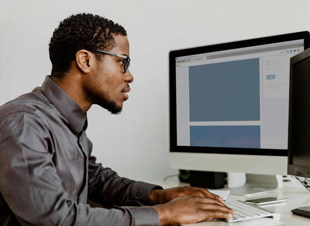 Businessman working on a computer screen mockup