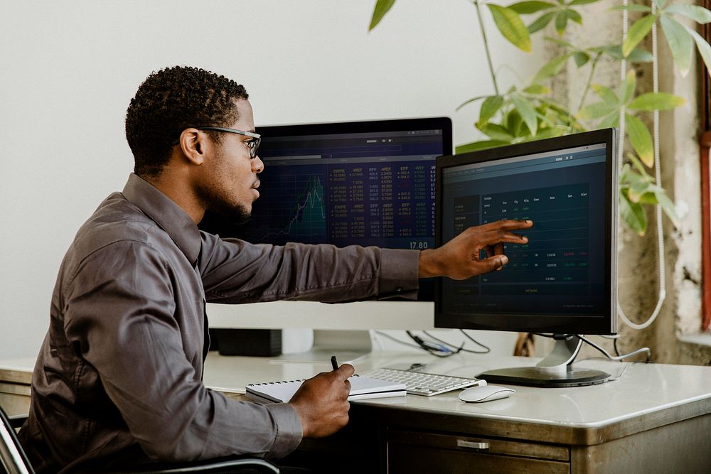 Black businessman working on a computer
