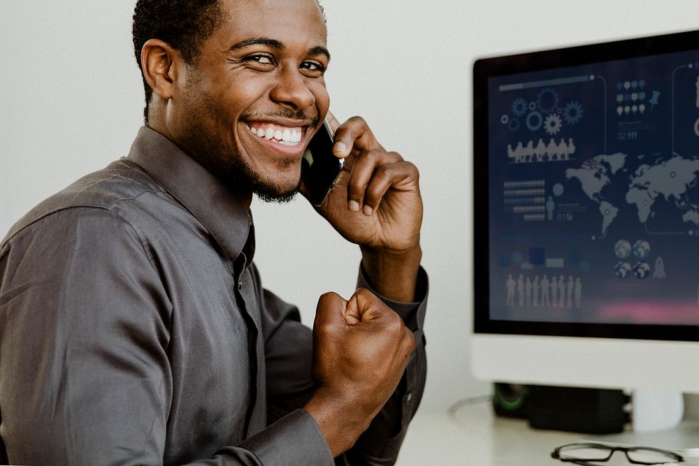 Happy black businessman talking phone | Premium Photo - rawpixel