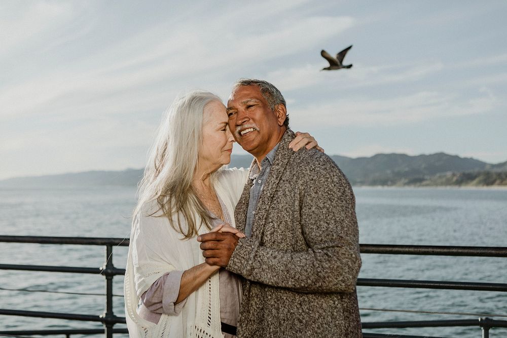 Cheerful senior couple dancing on Santa Monica Pier