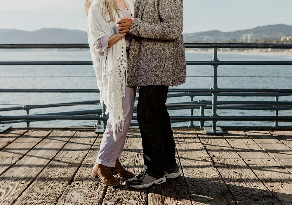 Cheerful senior couple dancing on Santa Monica Pier