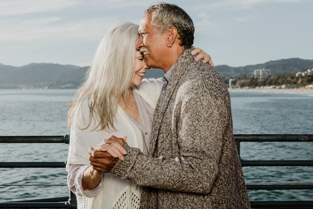 Romantic senior couple dancing on Santa Monica Pier