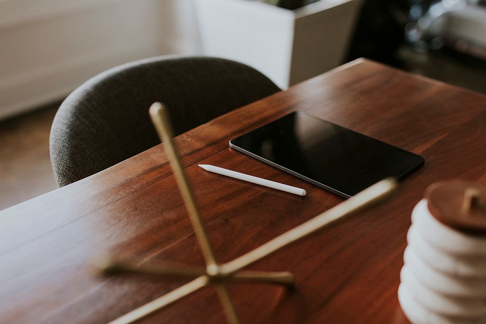 Digital tablet on a wooden table