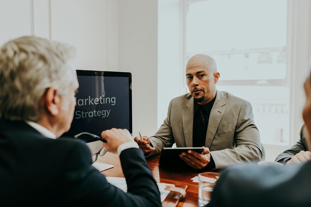 Businessmen in a marketing strategy meeting