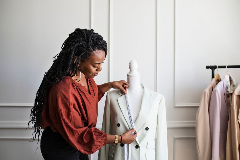 Young female designer in a boutique