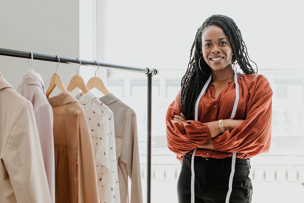 Designer wearing a measuring tape around her neck