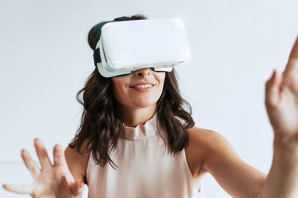 Happy woman enjoying a vr headset