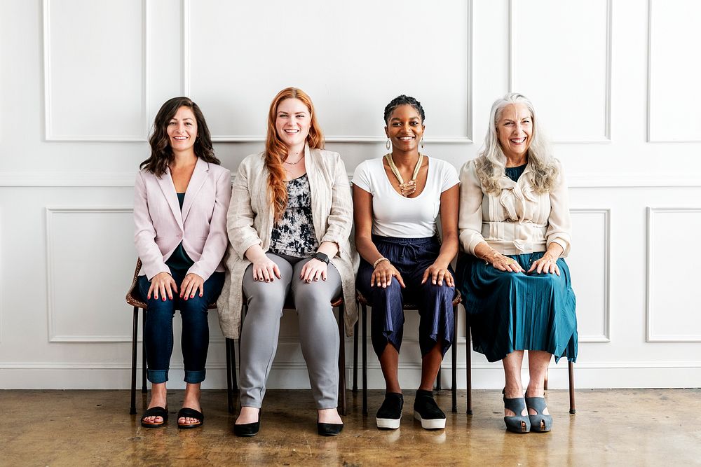 Empowering gorgeous businesswomen sitting together
