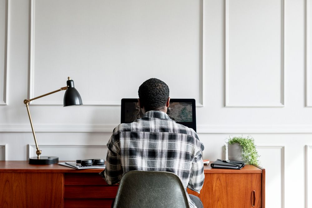 Black man using a computer