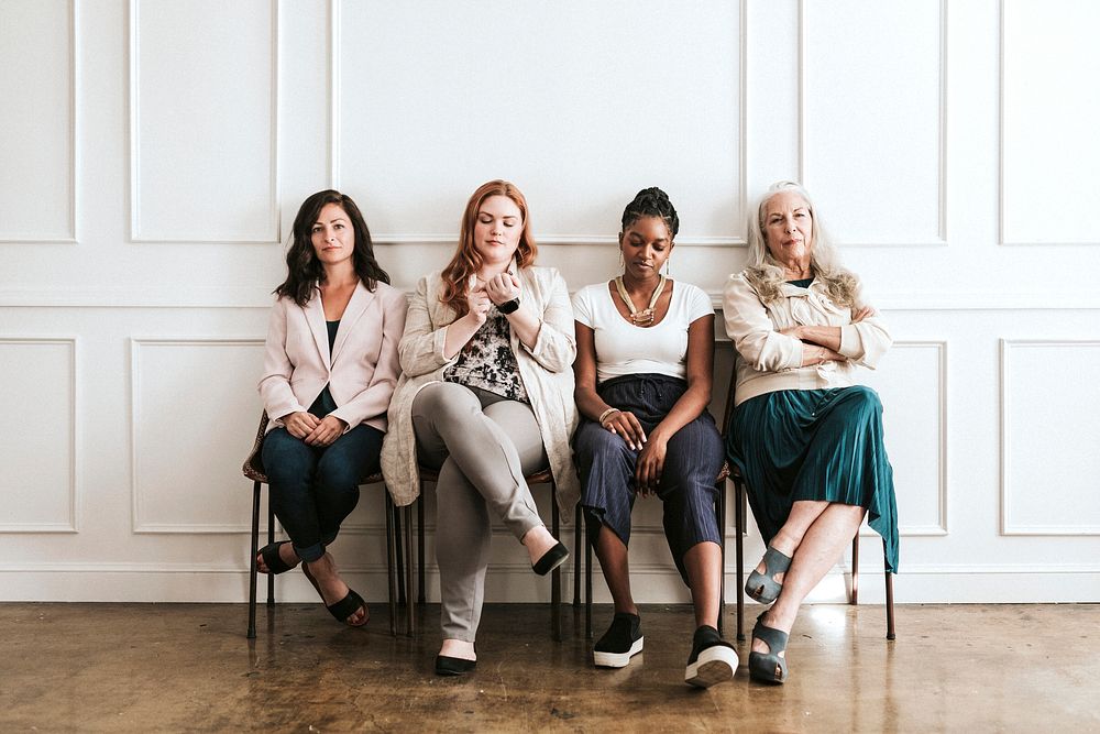 Empowering gorgeous businesswomen sitting together