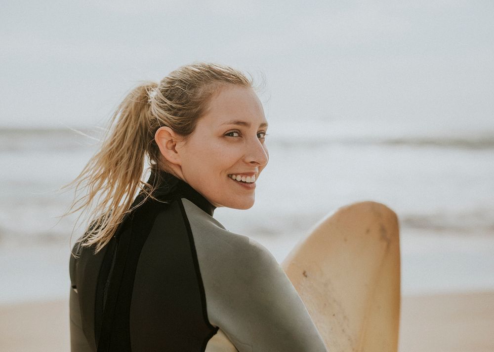 Happy surfer at the beach