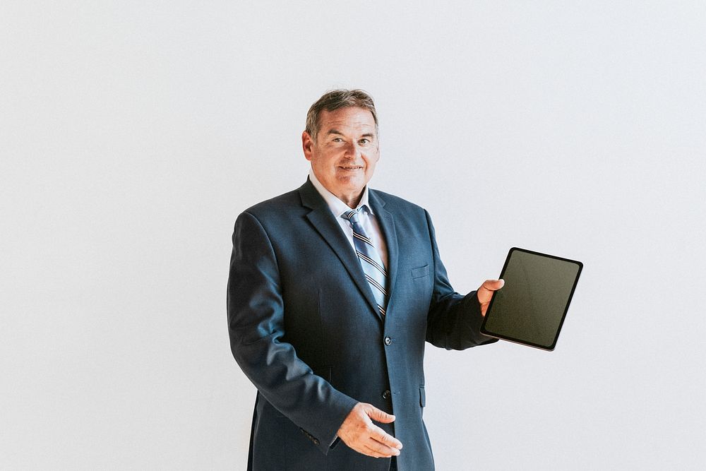 Businessman showing a digital tablet mobile phone wallpaper