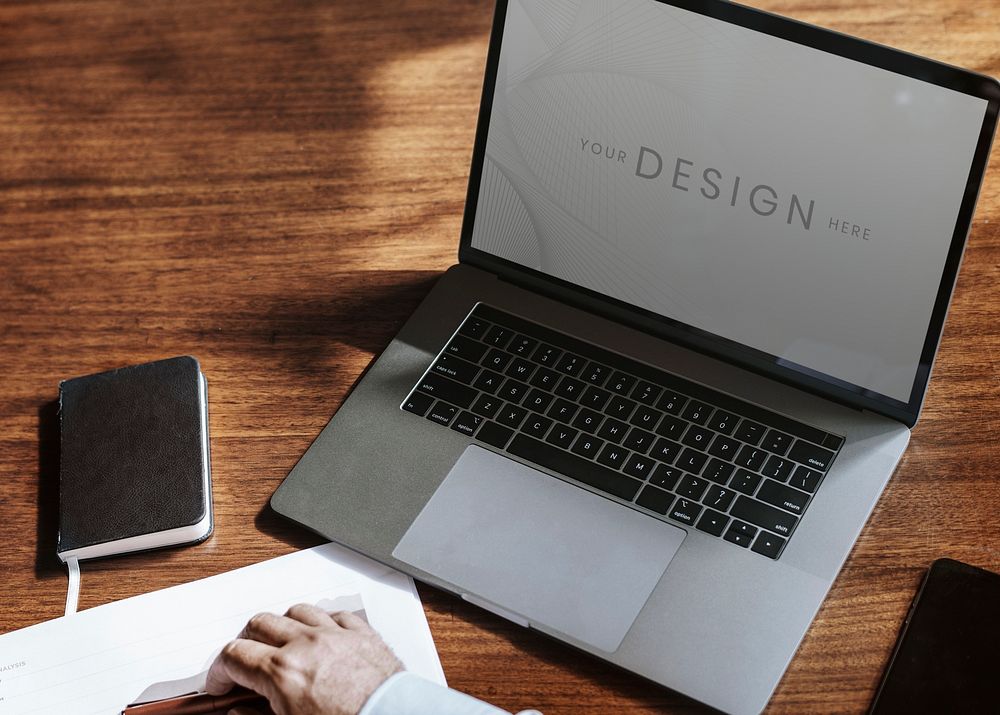 Businessman using a laptop screen mockup