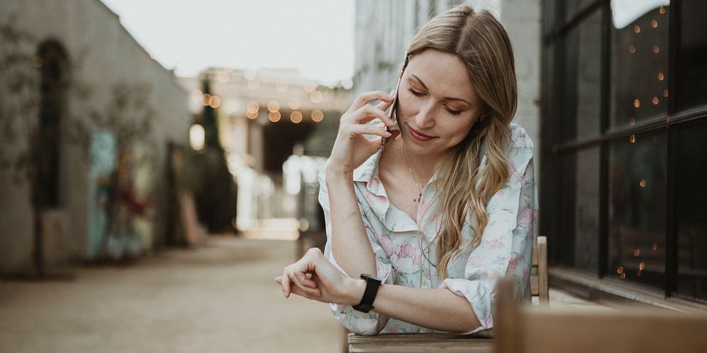 Woman talking on the phone outdoors