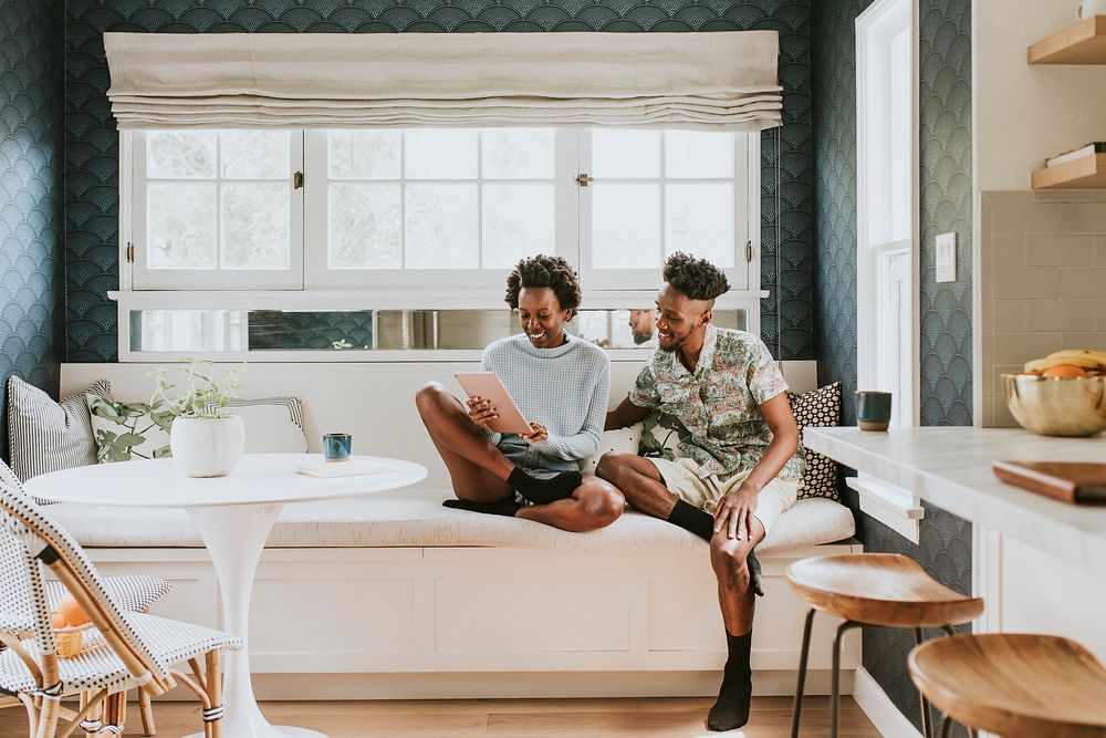 Black couple using a tablet together