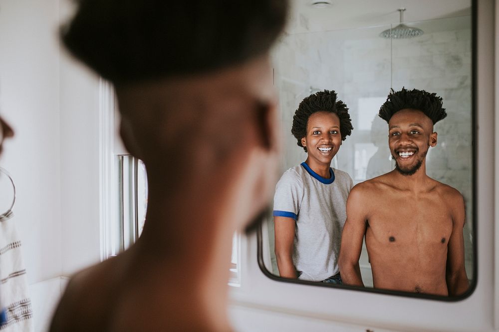 An african couple in a bathroom