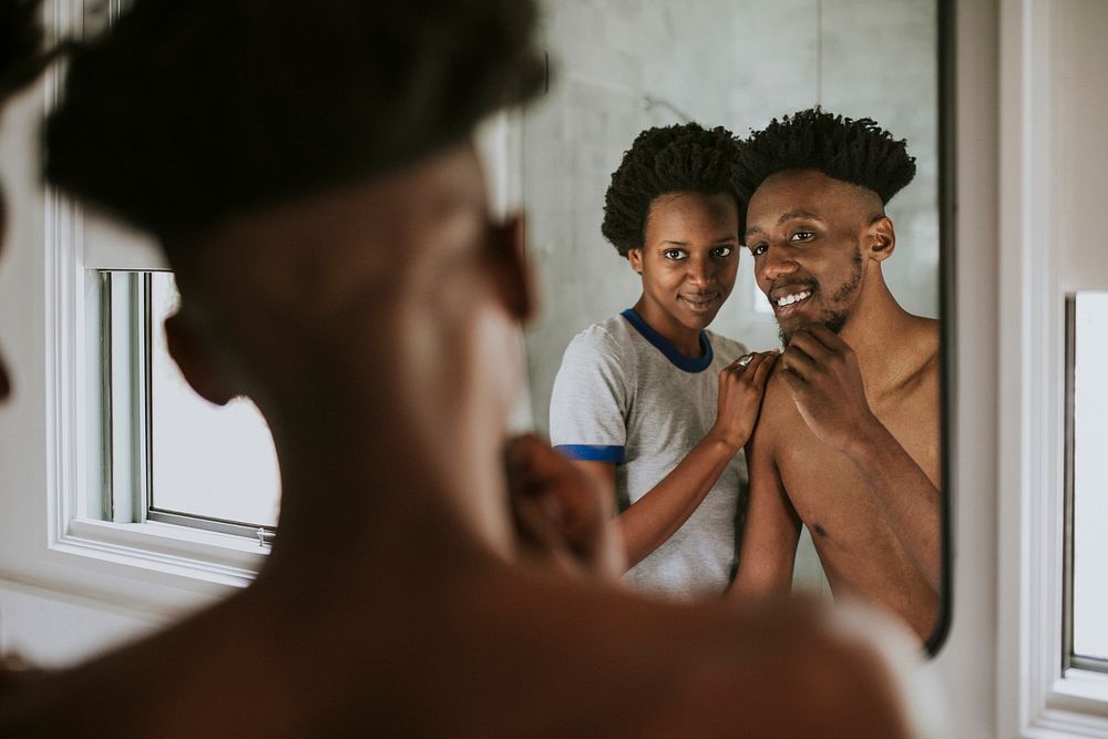 An african couple in a bathroom