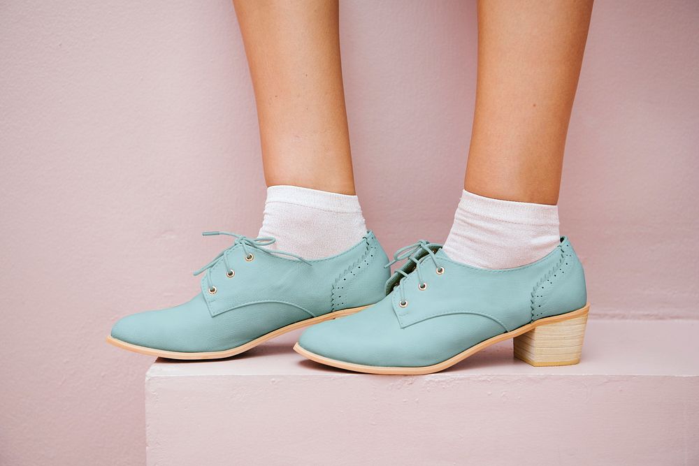 Woman in a pastel blue oxford shoes