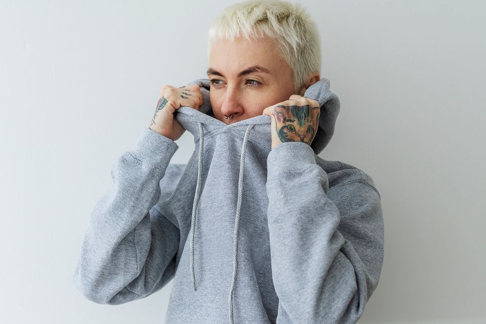 Cool woman in a gray hoodie
